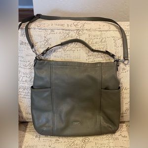 Coach Purse with shoulder strap and removable cross body strap.